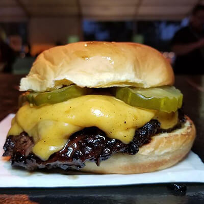 Gotham Burger Social Club's Smash Burger, Photo: Courtesy Gotham Burger Social Club