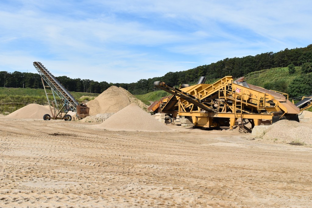 John Tintle, owner of the Sand Land site, was notified by the New York State Department of Environmental Conservation that it will have to shut down its operations. Independent/Stephen J. Kotz