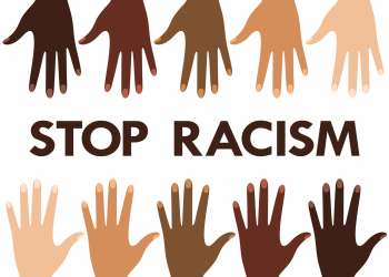 Poster against racism and discrimination with hands with different skin color