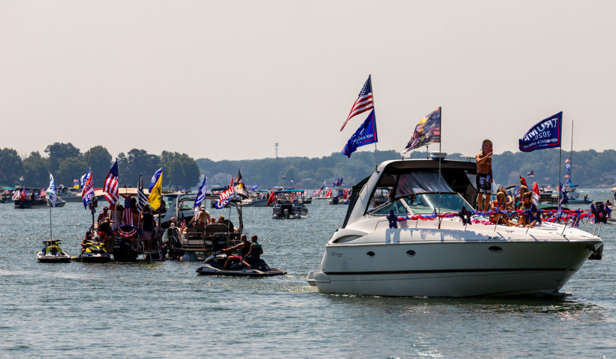Boats flying Trump 2020 flags for President Donald Trump on Lake Norman near the Trump National Golf Club Charlotte