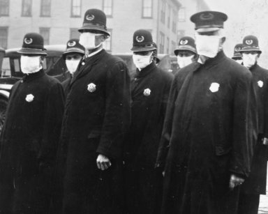 1918-flu-Spanish_flu_in_1918_Police_officers_in_masks_Seattle_Police_Department_detail_from-_165-WW-269B-25-police-l_cropped