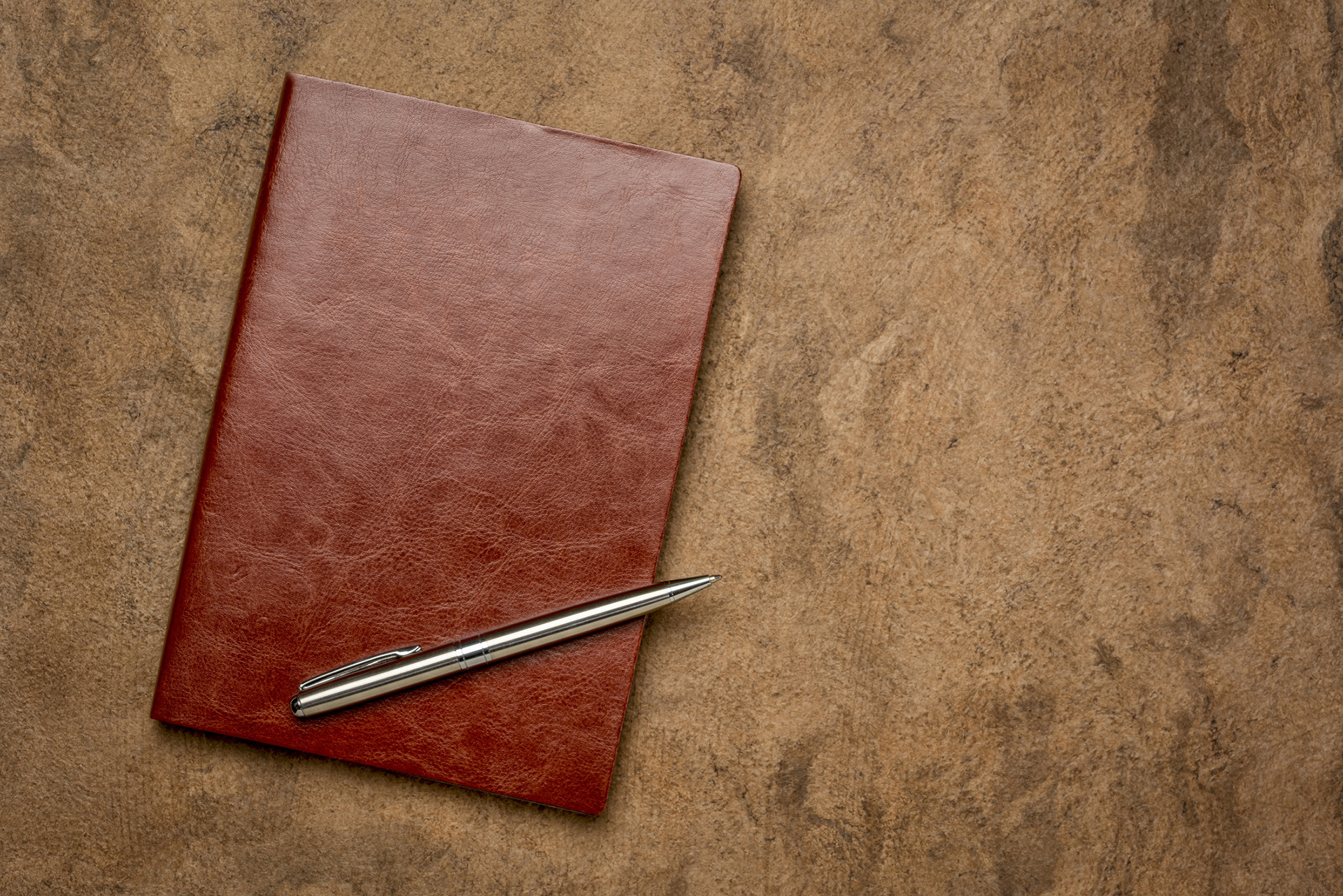 diary, journal or scrapbook in a rich brown leather