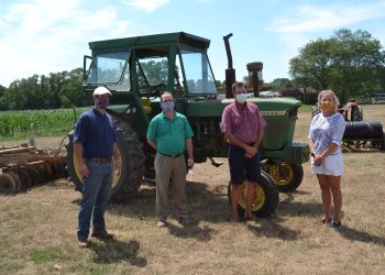 Suffolk County Legislature Presiding Officer Rob Calarco, Long Island Farm Bureau Administrative Director Robert Carpenter, Suffolk County Legislator Al Krupski and Southold Town councilwoman Sarah Nappa at Krupski Farms for harvest