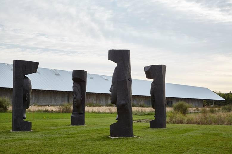 Jaume Plensa (Spanish, born 1955), Carlota (oak), Julia (oak), Laura Asia (oak), and Wilsis (oak), 2019, bronze. Courtesy Parrish Art Museum.