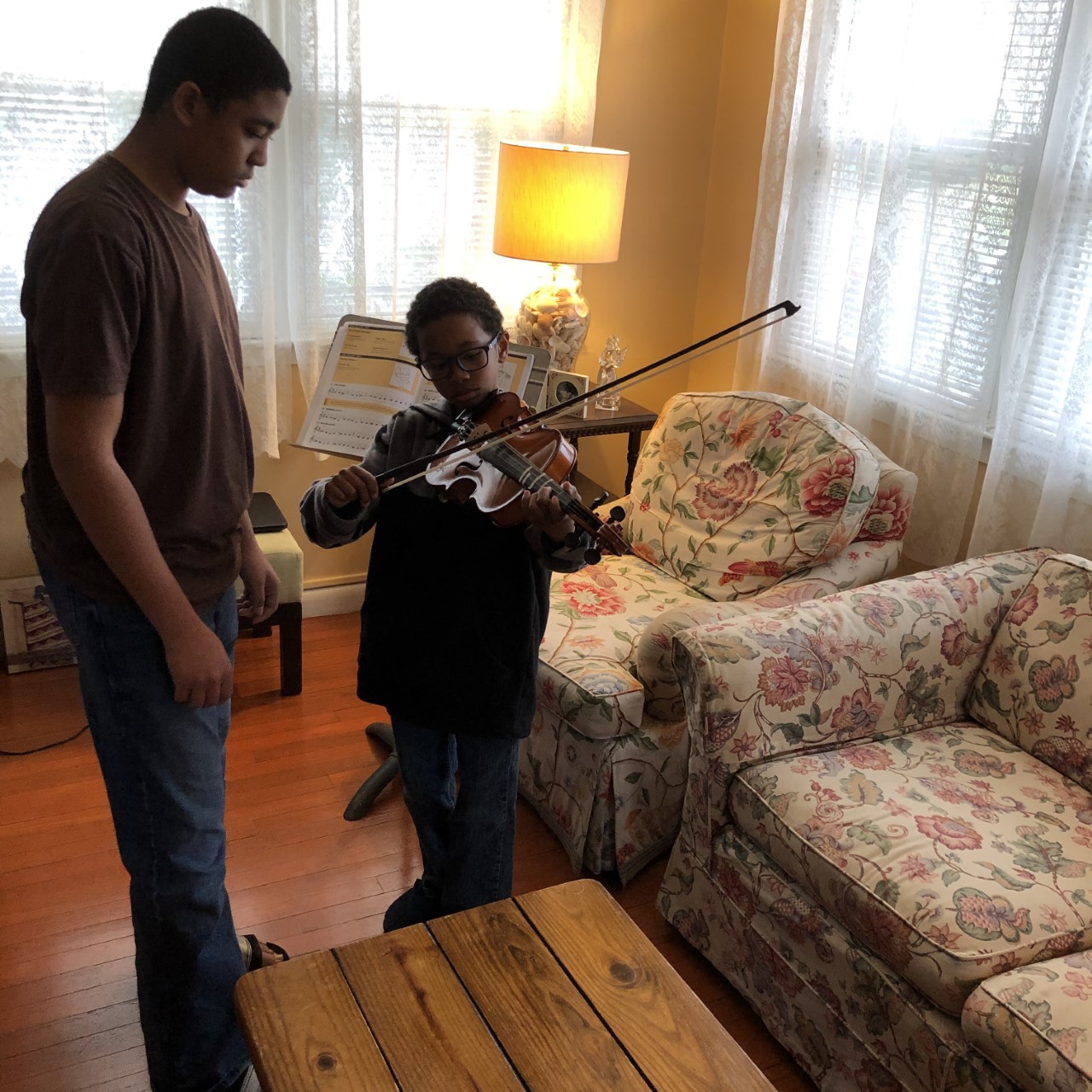 Riverhead-Middle-School-music-students-were-recently-tasked-with-teaching-family-members-how-to-play-an-instrument.-Independent_Courtesy-Riverhead-Central-School-District