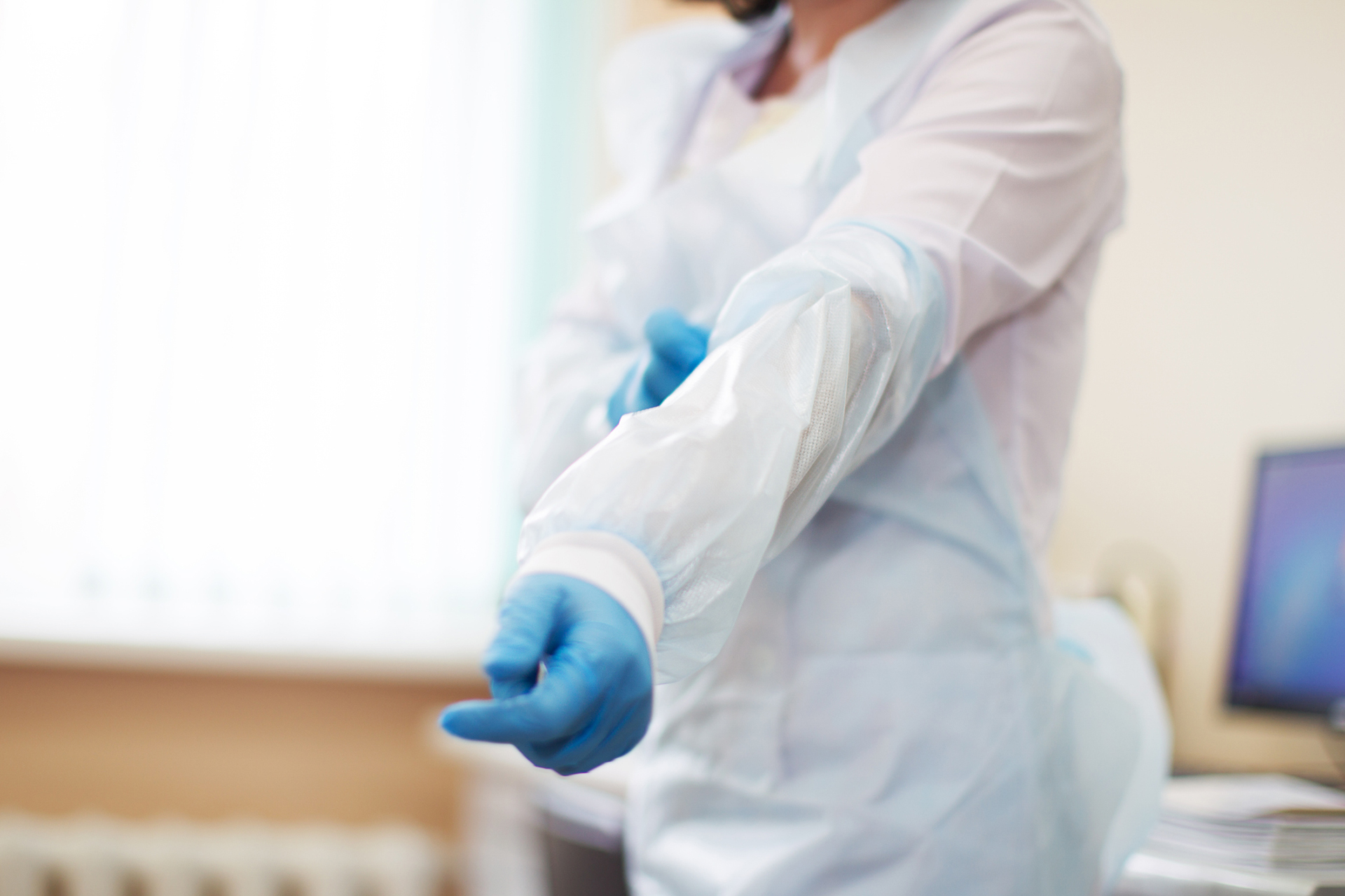 Hand of doctor in gloves.Medical procedure.