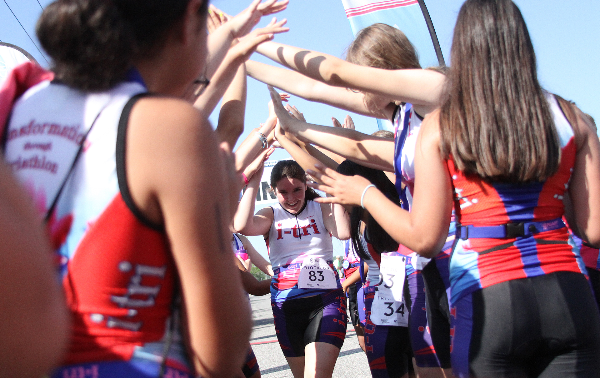 i-Tri Girls competing in the triathlon were met by their peers at the finish line.