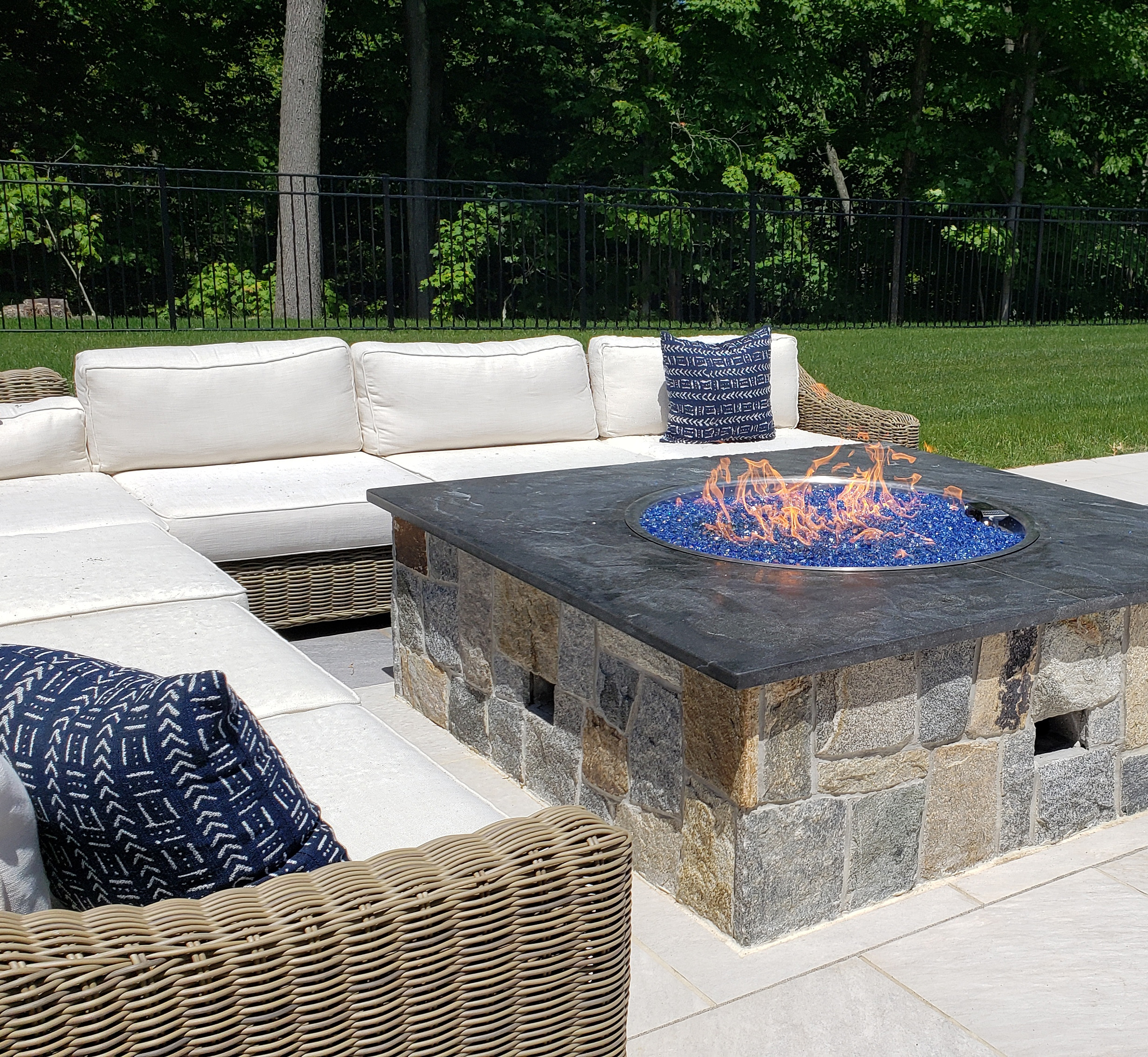 Outdoor firepit by Outdoor Kitchen Design Store. 