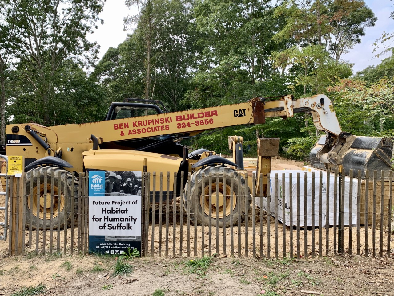 Ben Krupinski Builder works on Habitat for Humanity project in Springs