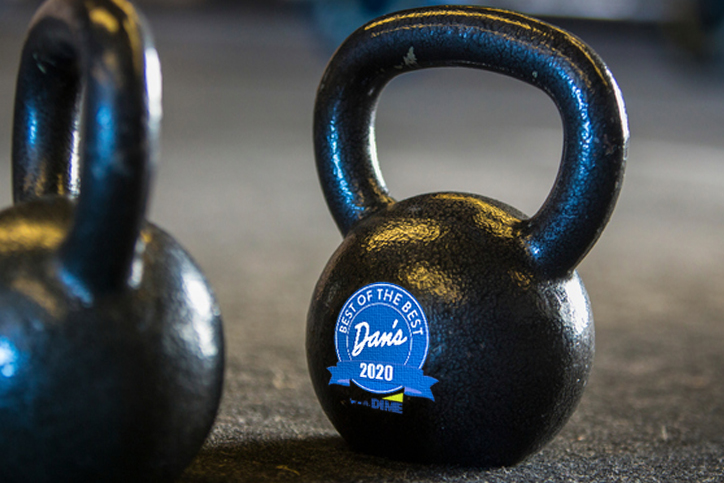 Kettlebells on gymnasium floor, close-up