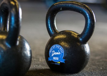 Kettlebells on gymnasium floor, close-up