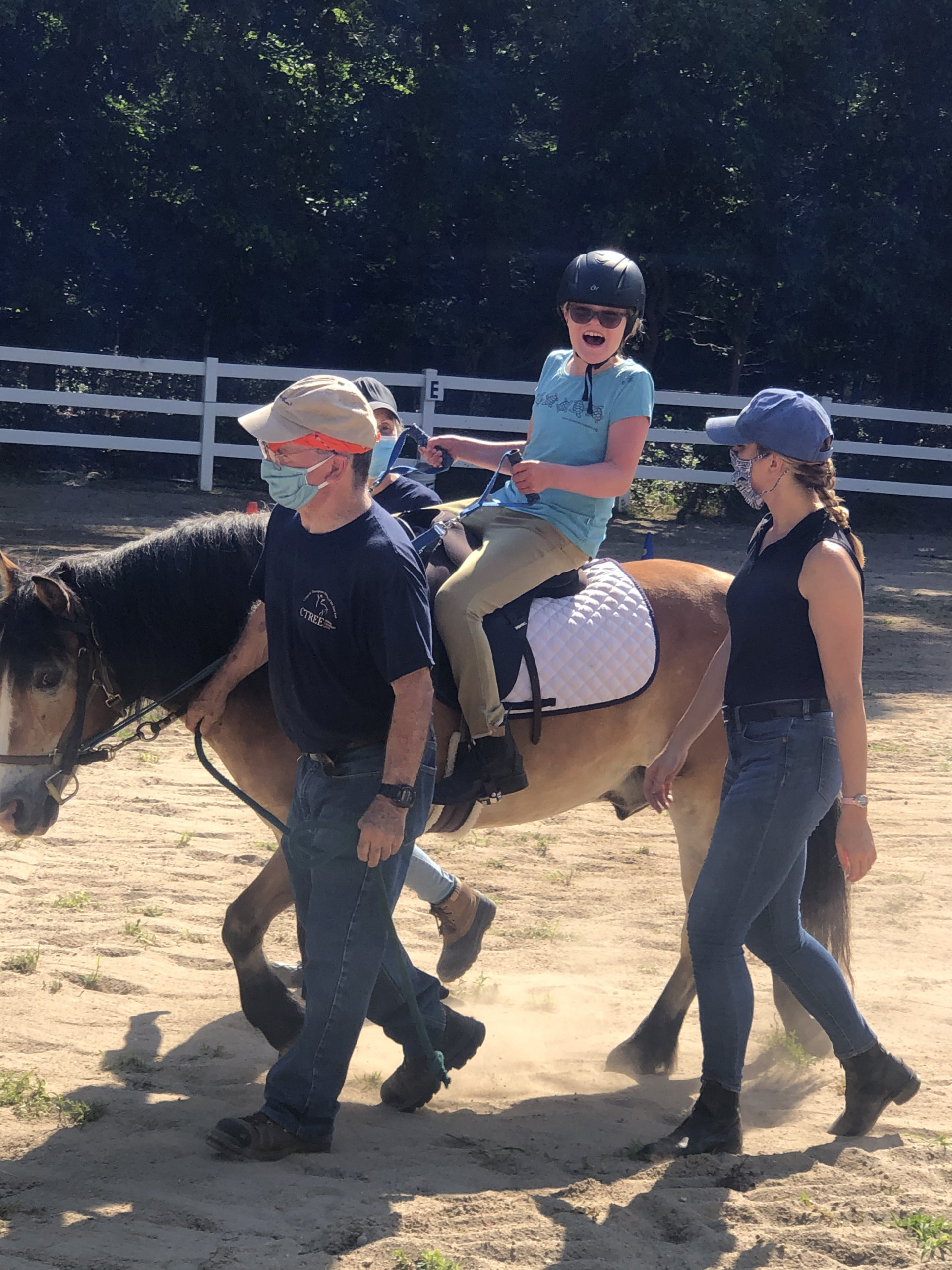 Kathryn riding Pumpkin alongside volunteers Jackie, Tom and Anne Courtesy CTREE