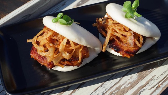 A Bao bun and rack of lamb at Union Sushi & Steak