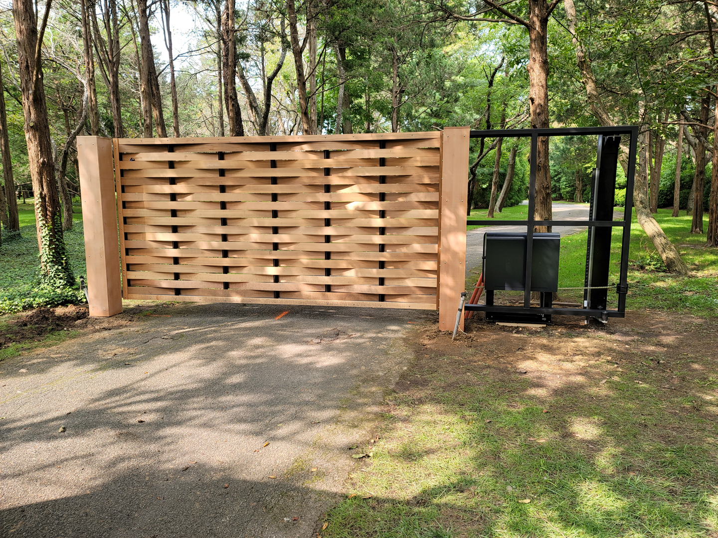An automated gate from Craftsman Fence Corp. Courtesy Craftsman Fence Corp.