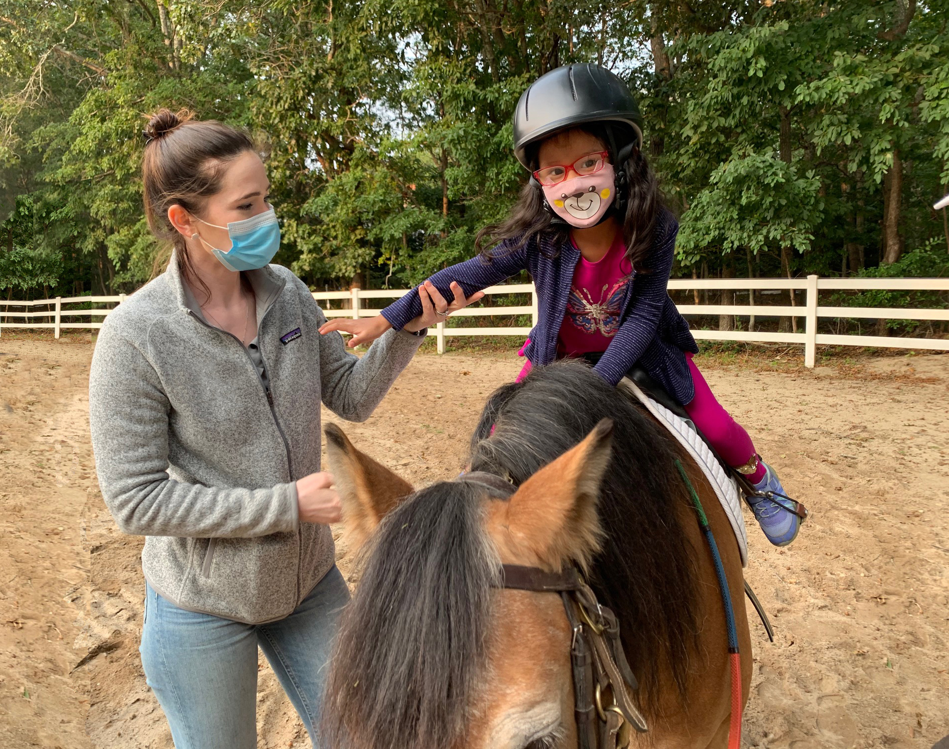 Kathryn riding Pumpkin alongside volunteers Jackie, Tom and Anne Courtesy CTREE