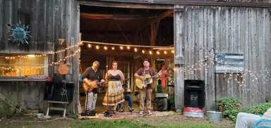 Delaney Hafener, accompanied by Bill Hafener and Finn Miller of Finn & His Rustkickers, converted a barn into a small music venue