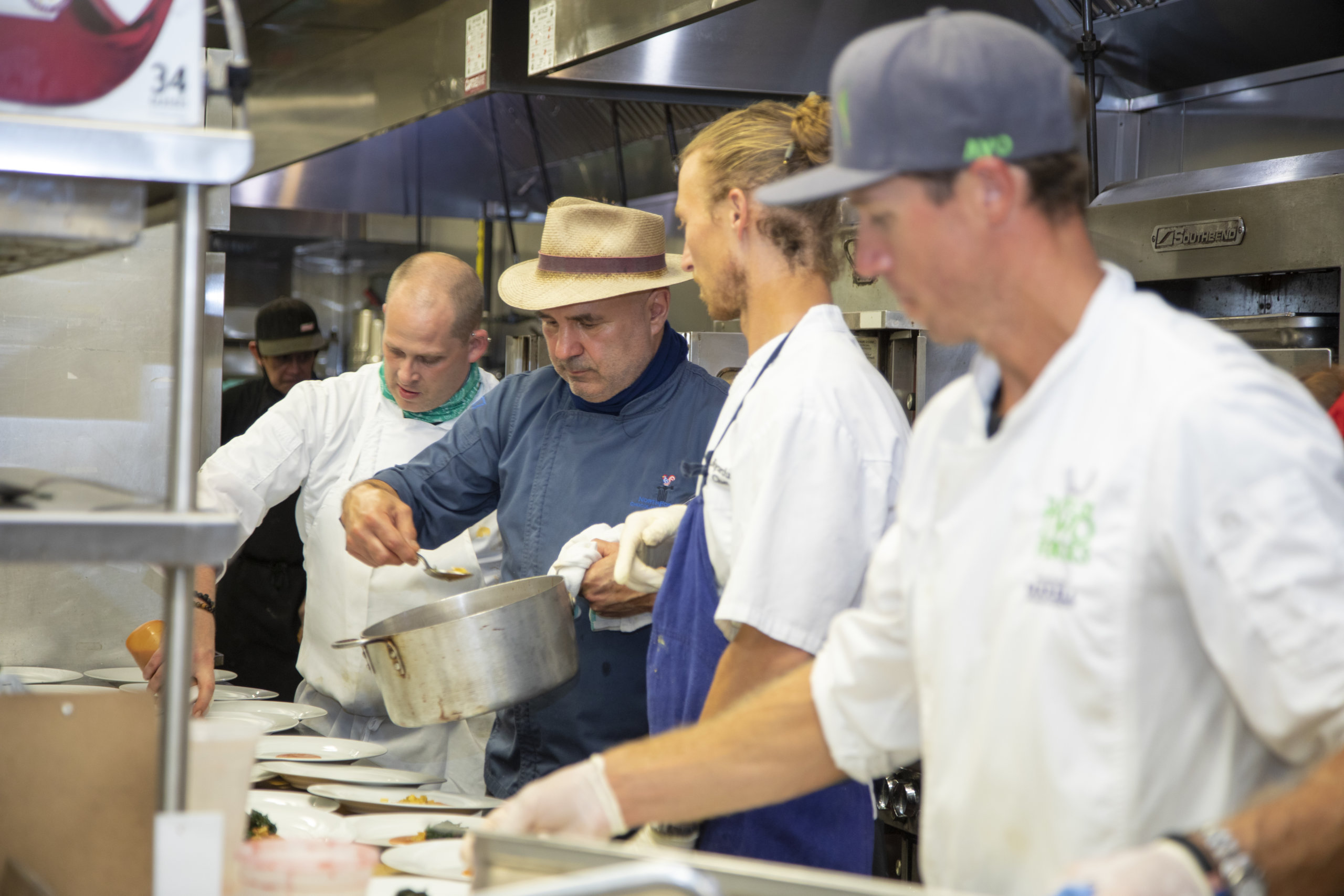 Drew Hiatt, Steve Amaral, Stephan Bogardus and Gordon Cox in the Dan's Chefs of the North Fork kitchen