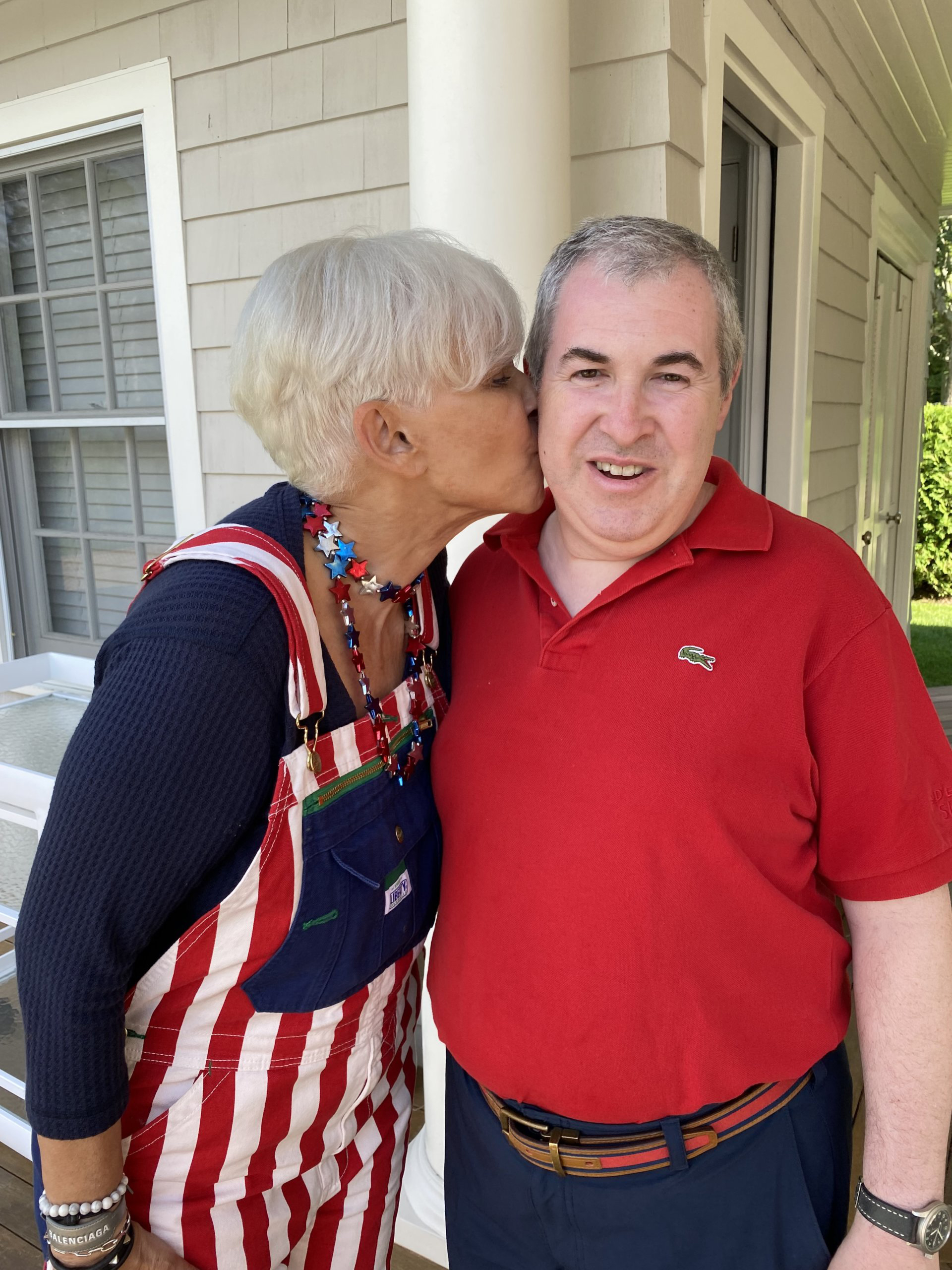 Carol Levin kisses her son Josh Levin