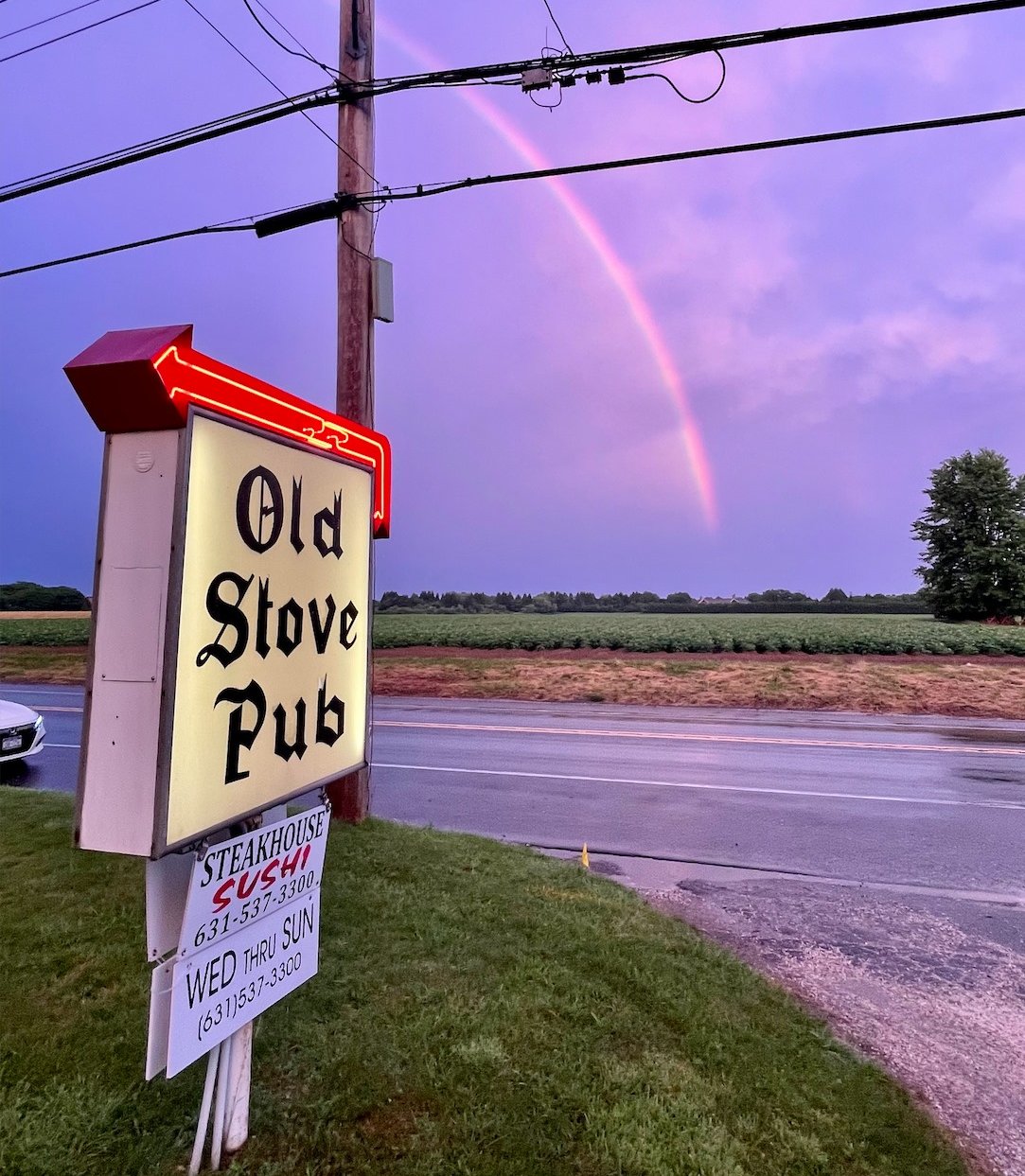 Old Stove Pub iconic neon sign