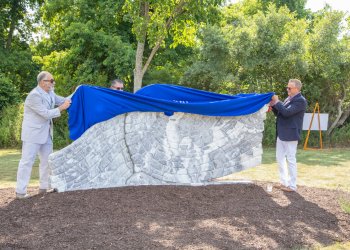 Jon Tibett and Dominic Anignano, left, at the unveiling of the sculpture.