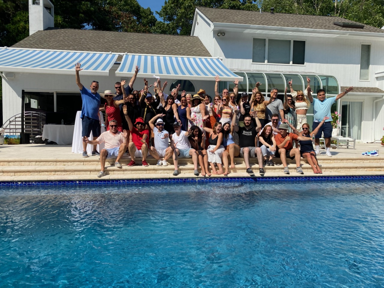 Schneps staff pool party in Westhampton