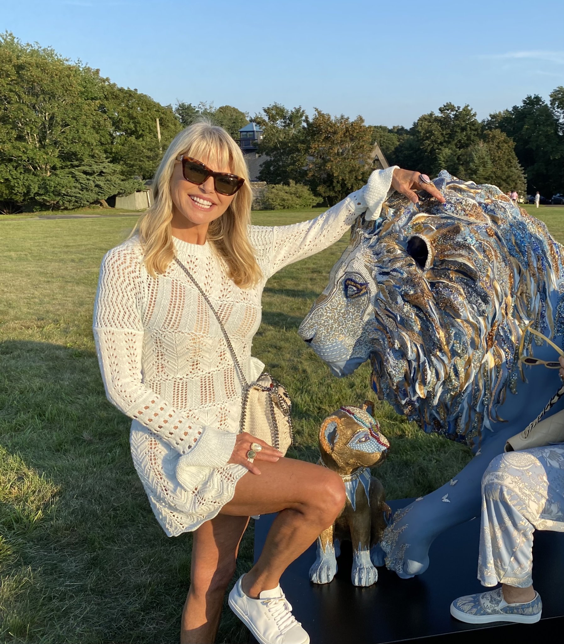Christie Brinkley with one of the lions for the parade.