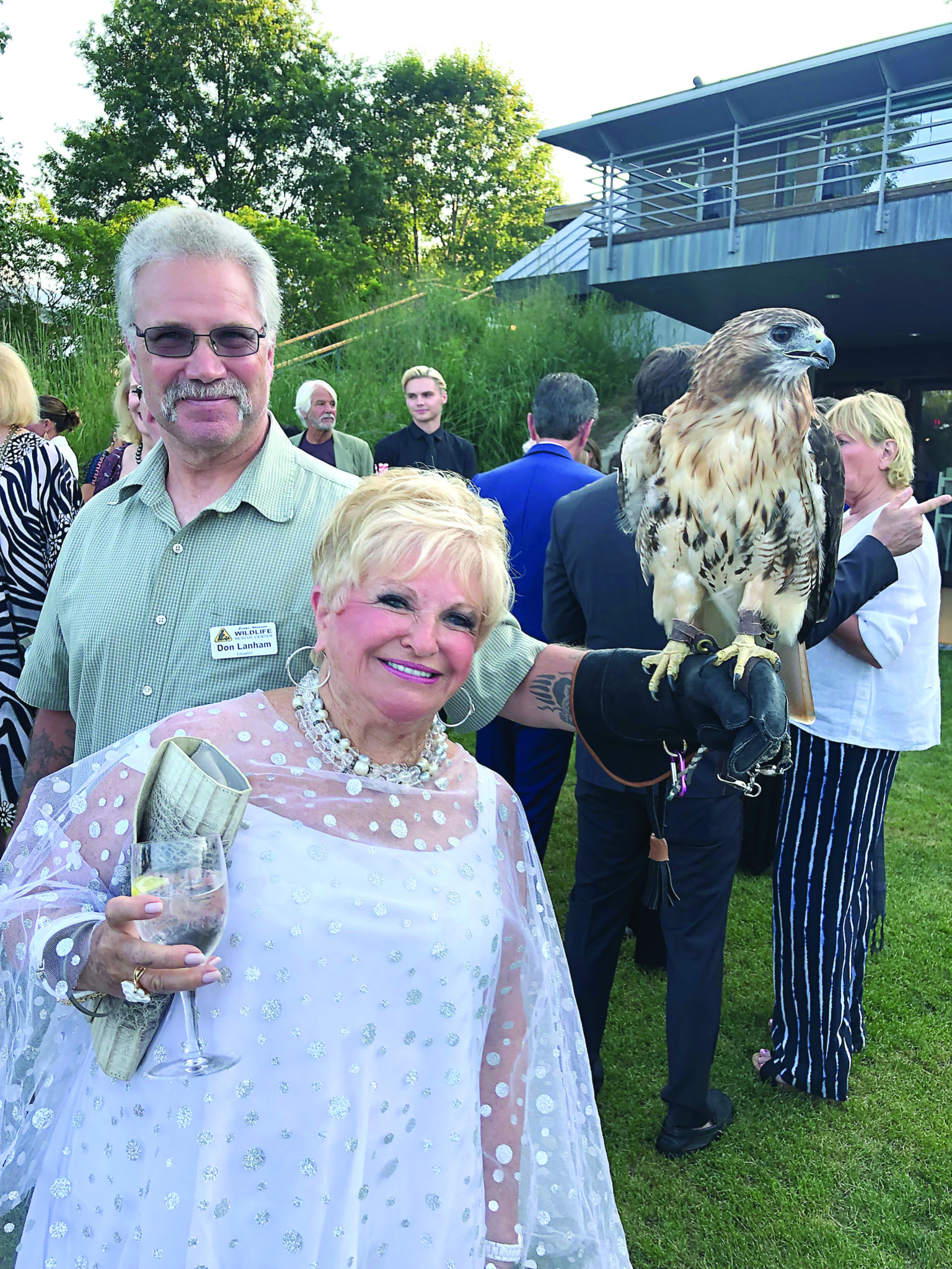 Victoria Schneps a little dubious of the hawk at the SOFO fundraiser