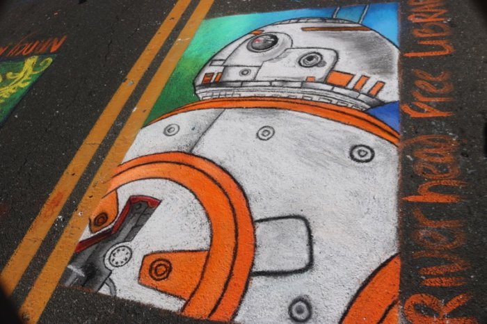 A spot-on chalk painting of BB-8 at Riverhead Mosaic Street Painting Festival