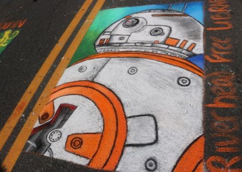 A spot-on chalk painting of BB-8 at Riverhead Mosaic Street Painting Festival