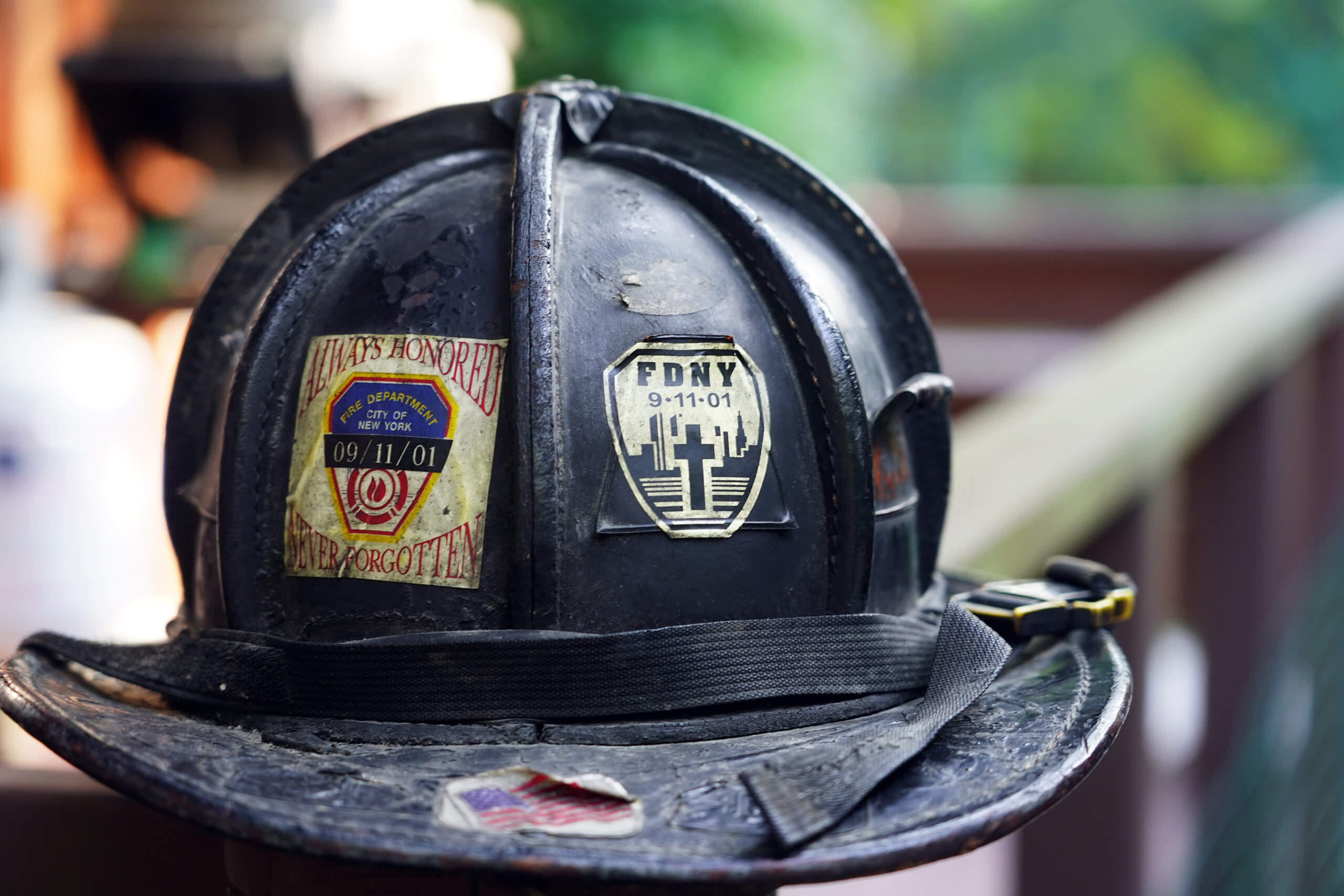 FDNY Lt. Raymond Brown’s helmet, August 29, 2021 in Sag Harbor, N.Y. Approaching the 20th anniversary of Sept. 11 he recalls how he survived the terrorist attack at the World Trade Center. ‘This helmet saved my life. Debris hit the back of my head knocking me out. It was almost 344.’ Referring to the 343 firefighters killed that day.
