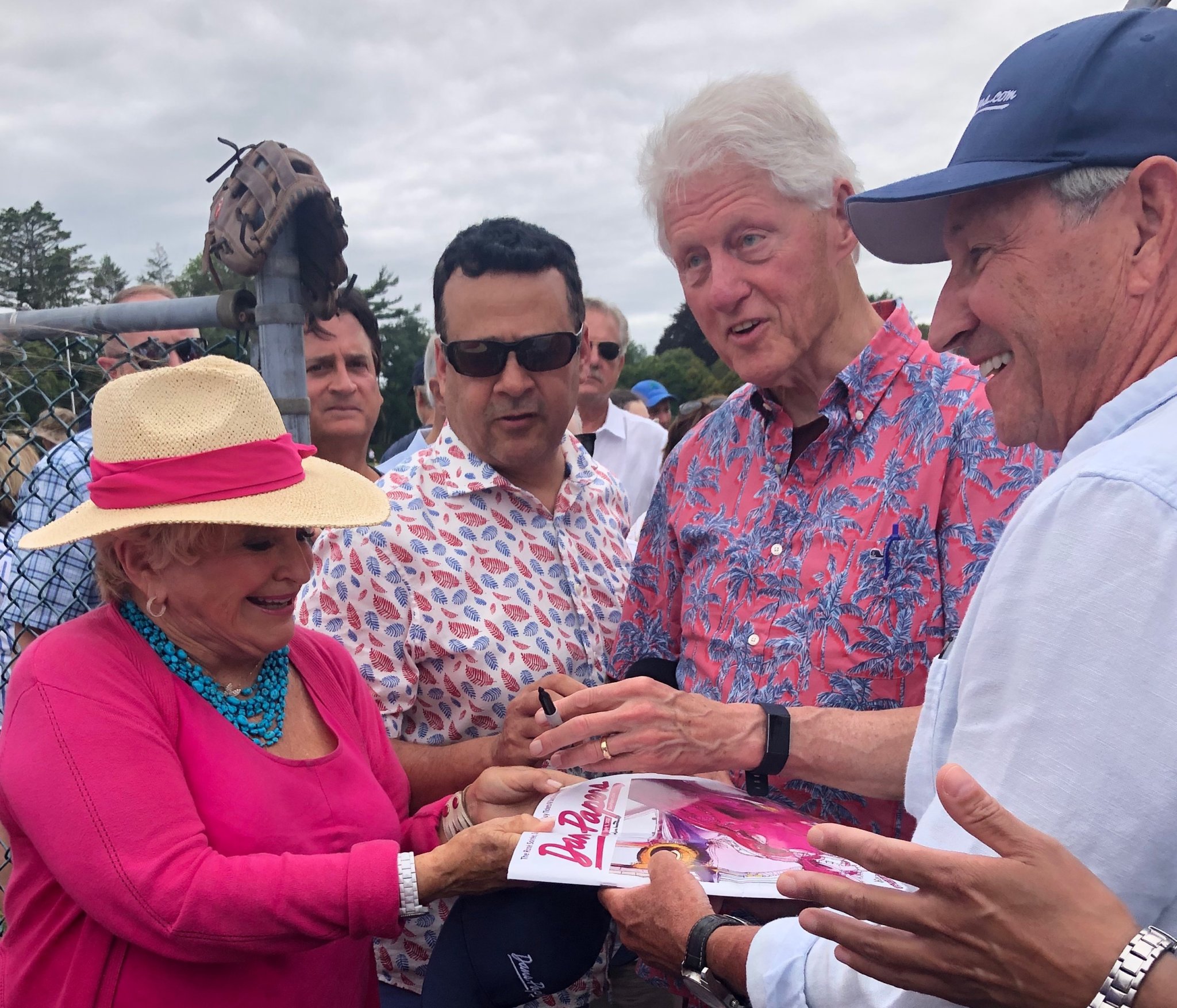 Bill Clinton graciously signed a copy of Dan’s Papers and hat for Victoria Schneps at the 2021 Artists & Writers Game