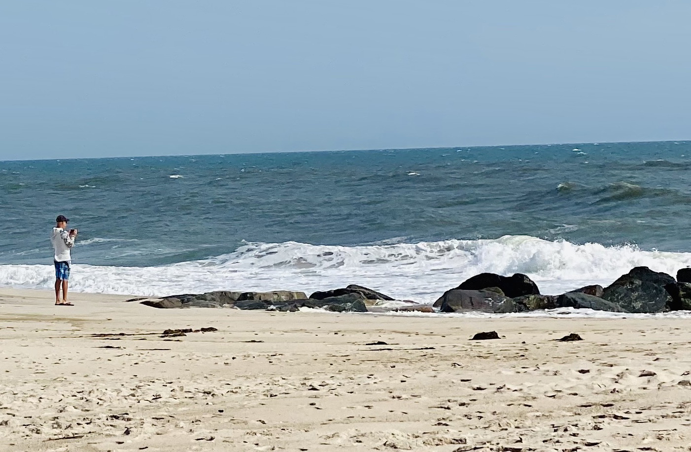 I prayed for forgiveness of my sins as I symbolically threw bread crumbs in the ocean in front of the Westhampton House.