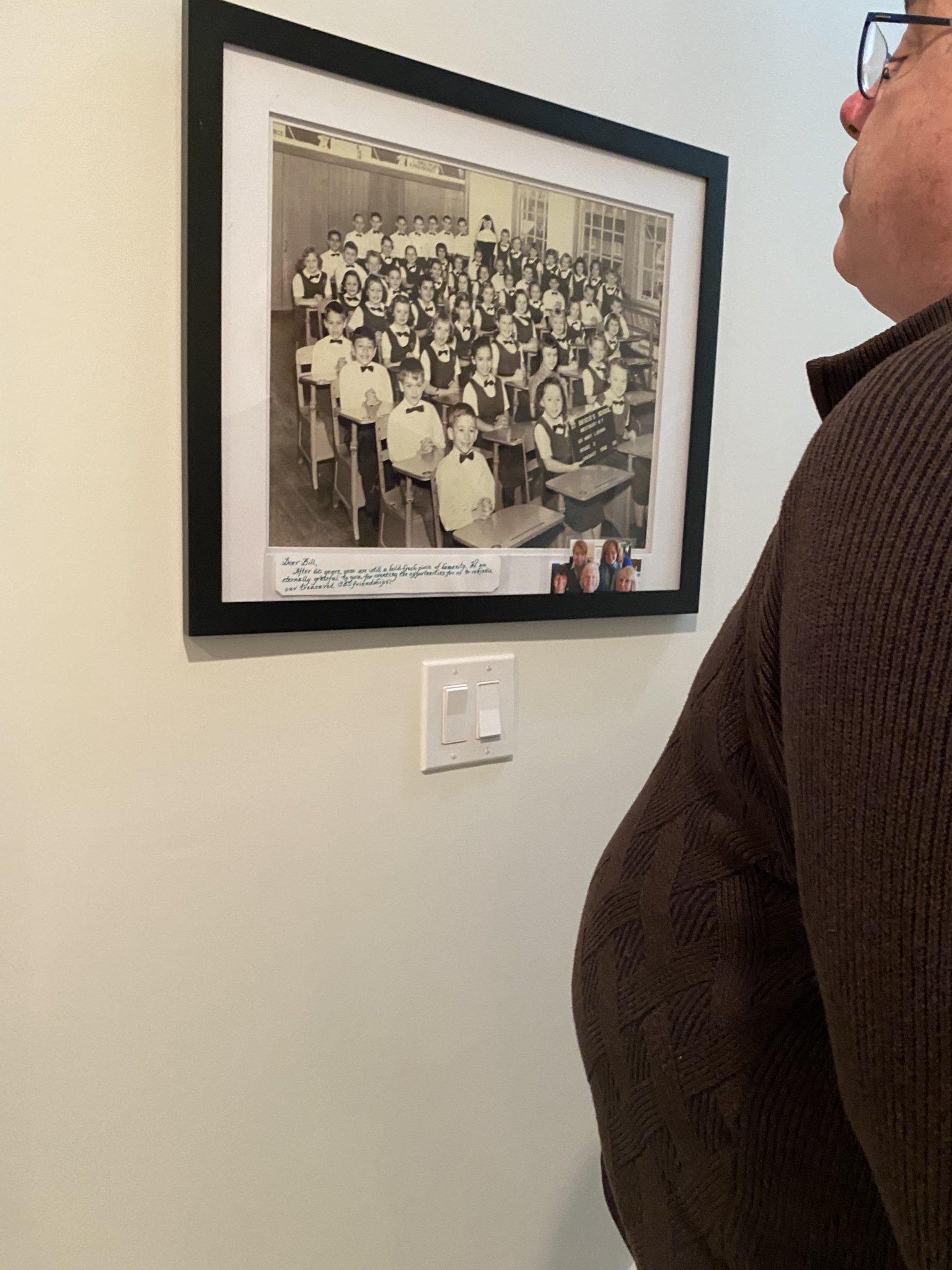 Bill O'Reilly (standing to the left of the nun in the photograph) showed us an old school photo taken during his time as student at St. Brigid’s School in Westbury.