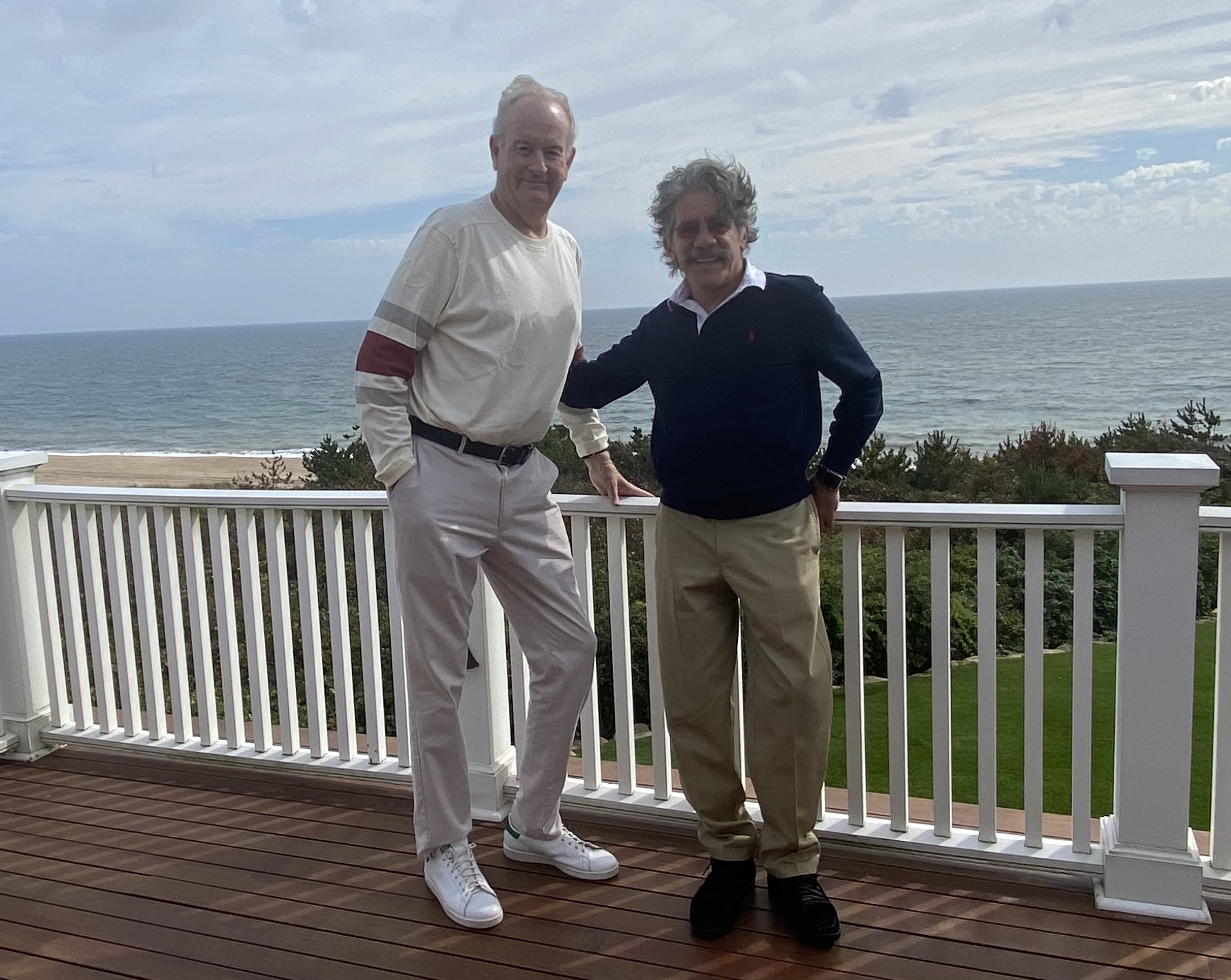 Bill O'Reilly and Geraldo Rivera out on O'Reilly's Montauk deck overlooking the ocean.