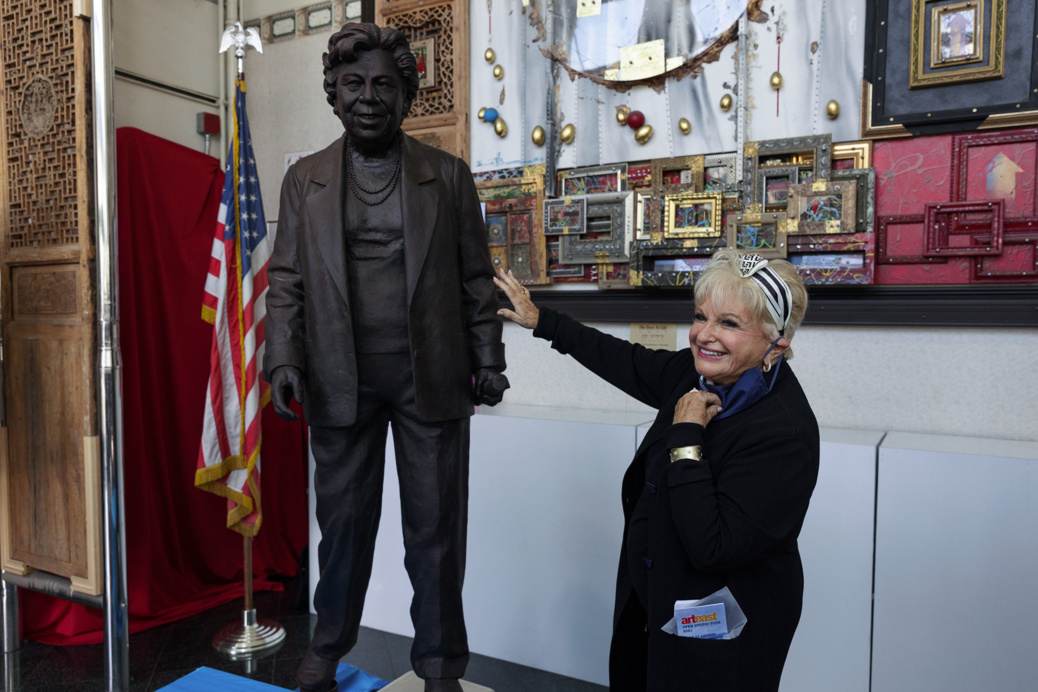 Vicki Schneps poses for a photo with a newly unveiled statue of former Queens Borough President Claire Shulman on Thursday, Oct. 7, 2021.