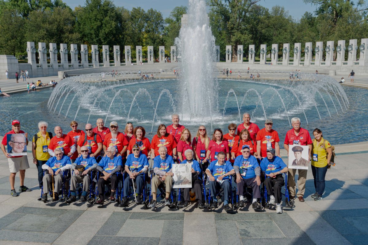 Nine World War II Veterans, their Guardians and Honor Flight Long Island officials at the Washington, D.C. World War II memorial on October 3