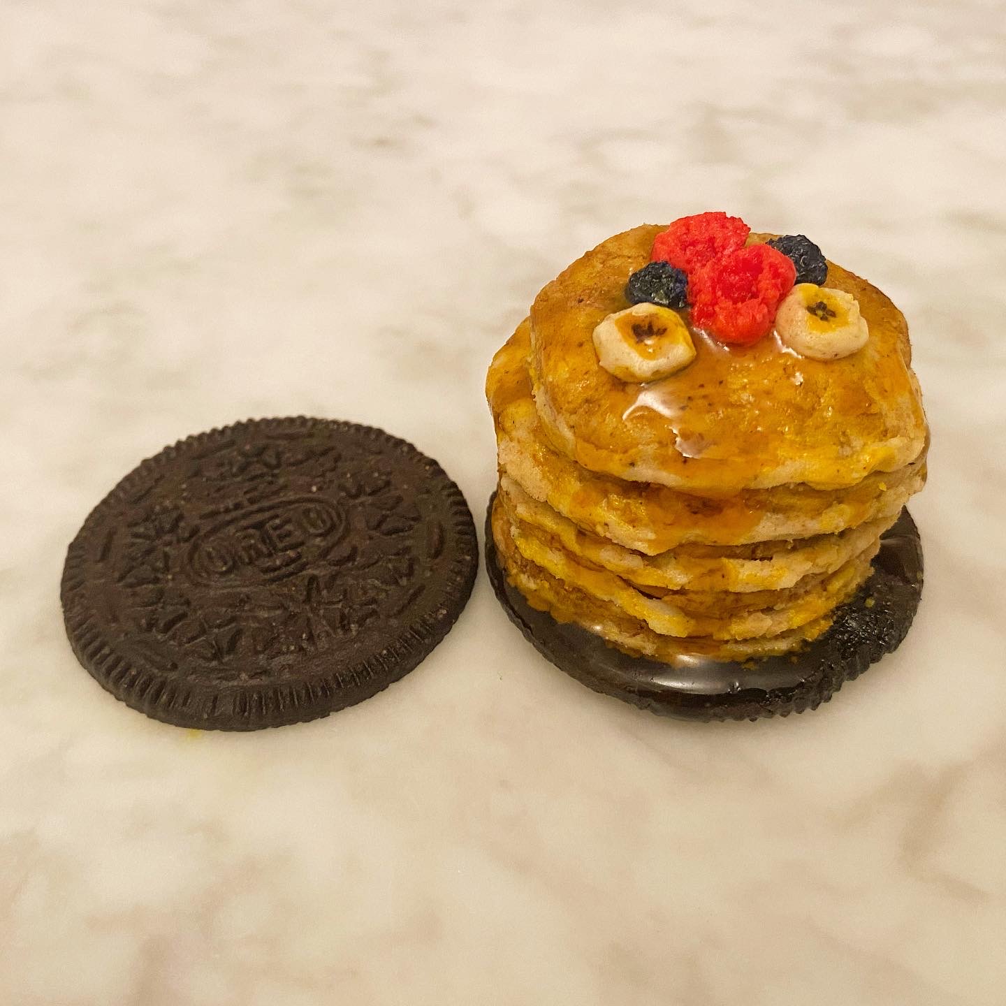 Pancake stack – dyed Oreo cream plated on Oreo cookie by Harley Langberg