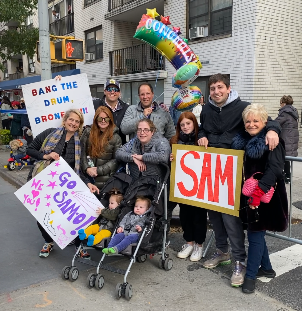 The family cheers for Sam as he passes us at First Avenue and 90th Street.