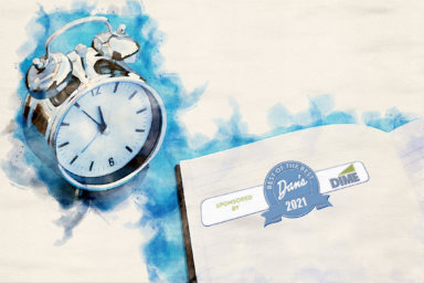 alarm clock on blue table with notepad in watercolors