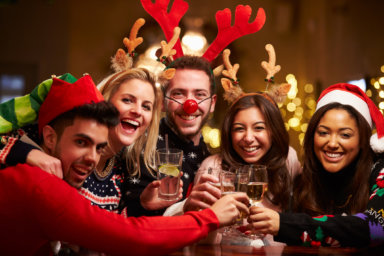 Multicultural friends can gather at the Holiday Hop Bar Crawl in Riverhead