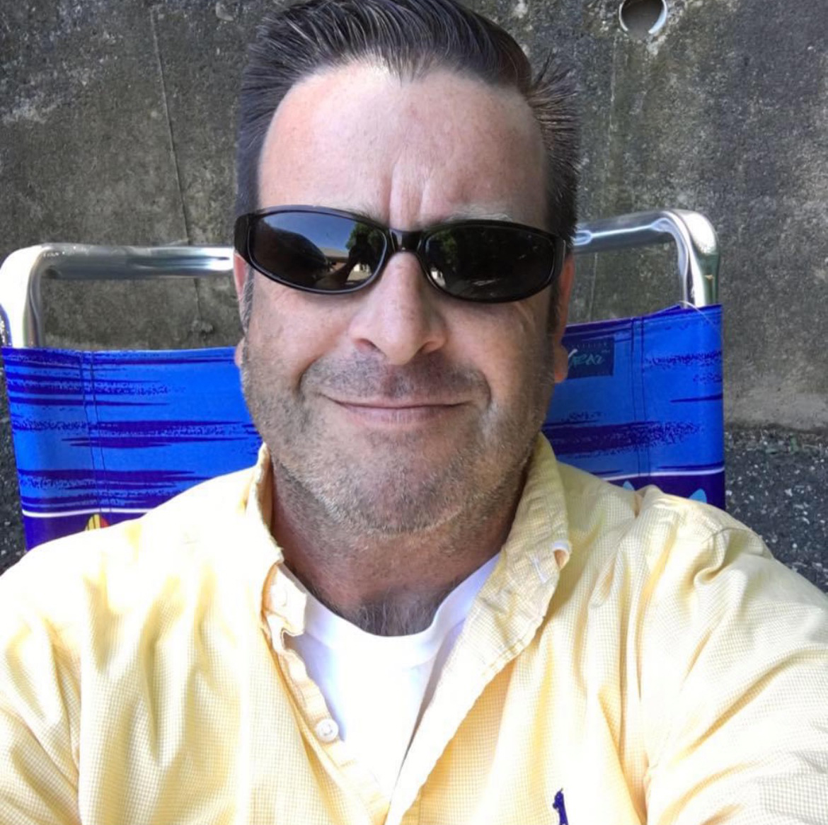 Neil Salvaggio wearing is ever-present shades