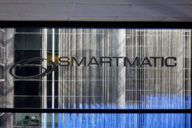 FILE PHOTO: The corporate logo of Smartmatic is seen at its offices in Caracas