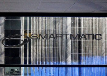 FILE PHOTO: The corporate logo of Smartmatic is seen at its offices in Caracas