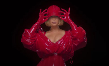 Beyonce shows off faux latex gear in her IVY Heart campaign video