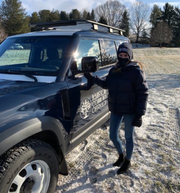 Marit Molin with Hamptons Community Outreach's new Land Rover Defender SUV