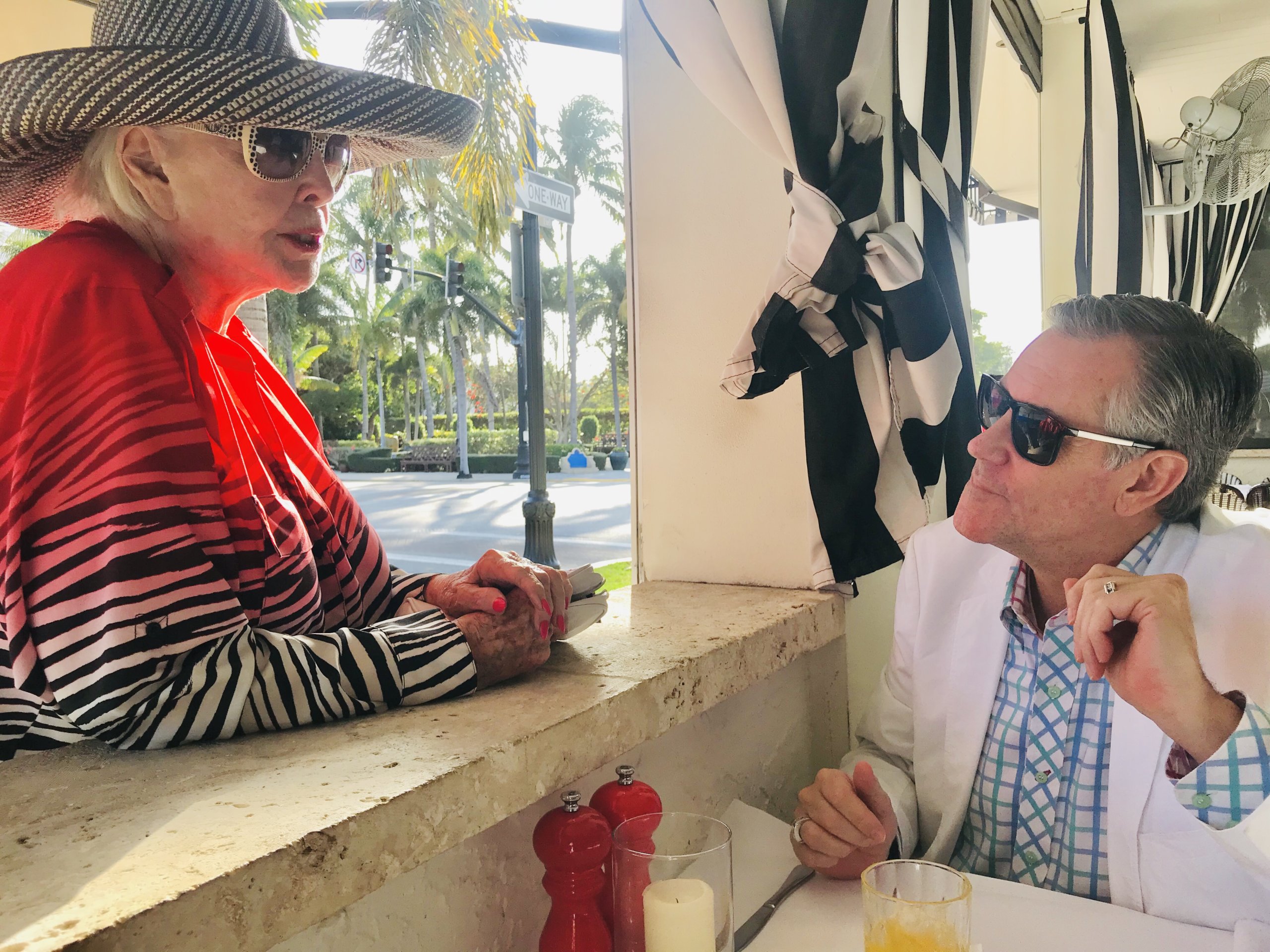 Popular Palm Beach entertainer Rob Russell, whose family docked their yacht "The Mother Marion" for decades in Sag Harbor, chats with Jean Dolan, founder of the Jazz Society of Palm Beach, at the Bricktops Restaurant