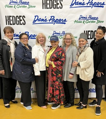 Victoria Schneps (center) President of Dan's Papers with friends and Schneps employees at at Dan's Papers Home & Garden Show