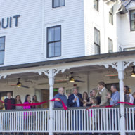 Officials held a ribbon cutting at The Chequit, owned by Stacey Soloviev, on May 7