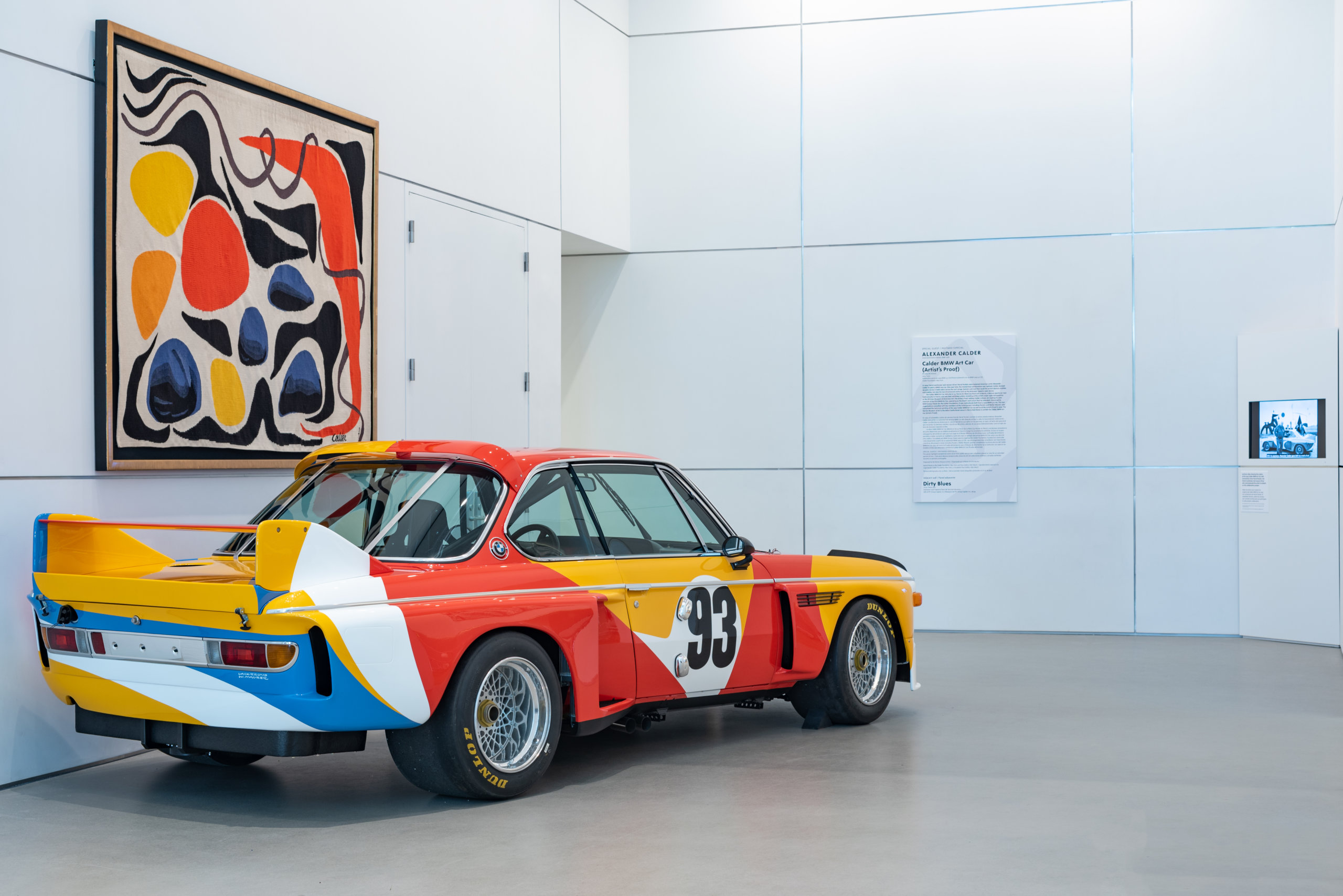 Calder Car: Installation of Special Guest: Calder BMW Art Car at the Norton Museum of Art (November 13, 2021 – April 24, 2022). Courtesy of Calder Foundation, New York. © 2021 Calder Foundation, New York / Artists Rights Society (ARS), New York. Photo: Ashley Kerr.