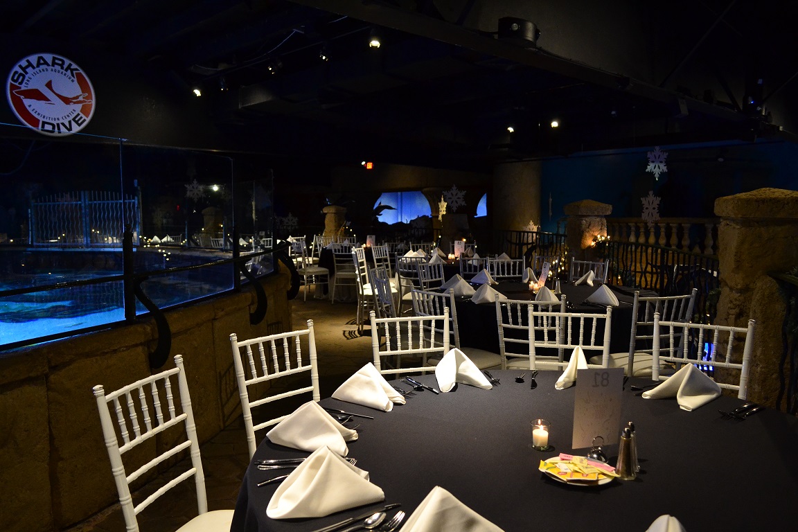 Tables set for Fishes and Wishes at the Long Island Aquarium